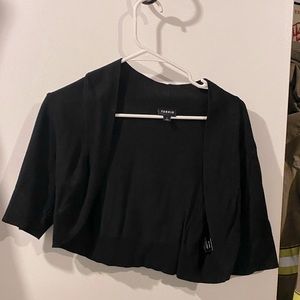 Size 1 or 14/16 half shrug cardigan from Torrid.